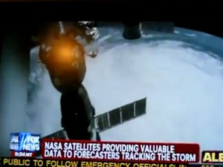 UFO Filmed By A Satellite  Flying Over Hurricane Irene From Space 8-26-2011