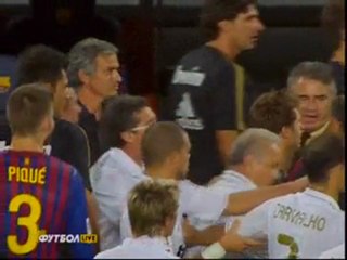 Jose Mourinho gouging the eye of Barcelona coach Tito ...