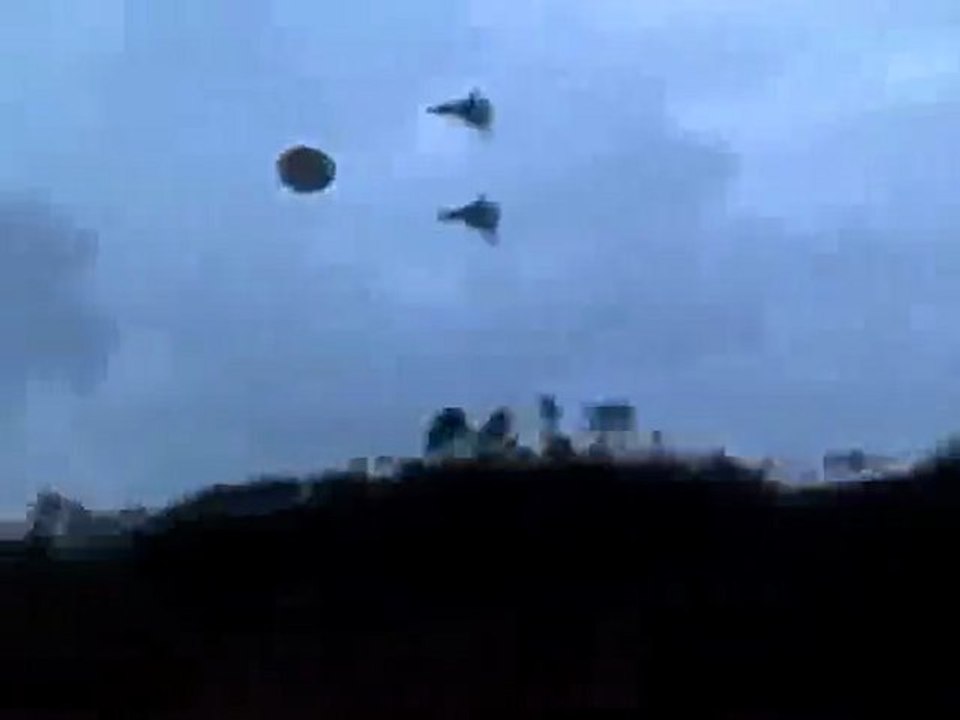 Two Fighter Jets Escorting UFO
