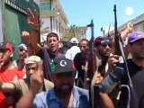 Los rebeldes libios cantan su victoria en Trípoli...