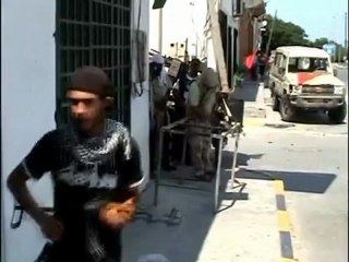 Libya rebels storm Tripoli's Abu Salim district