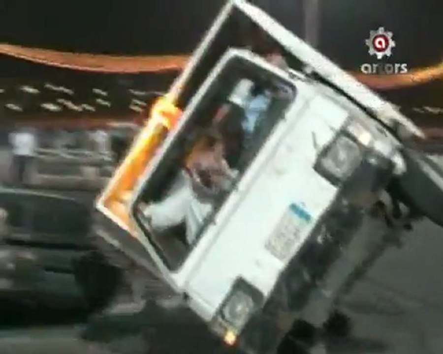 Garbage truck drifting in two wheels