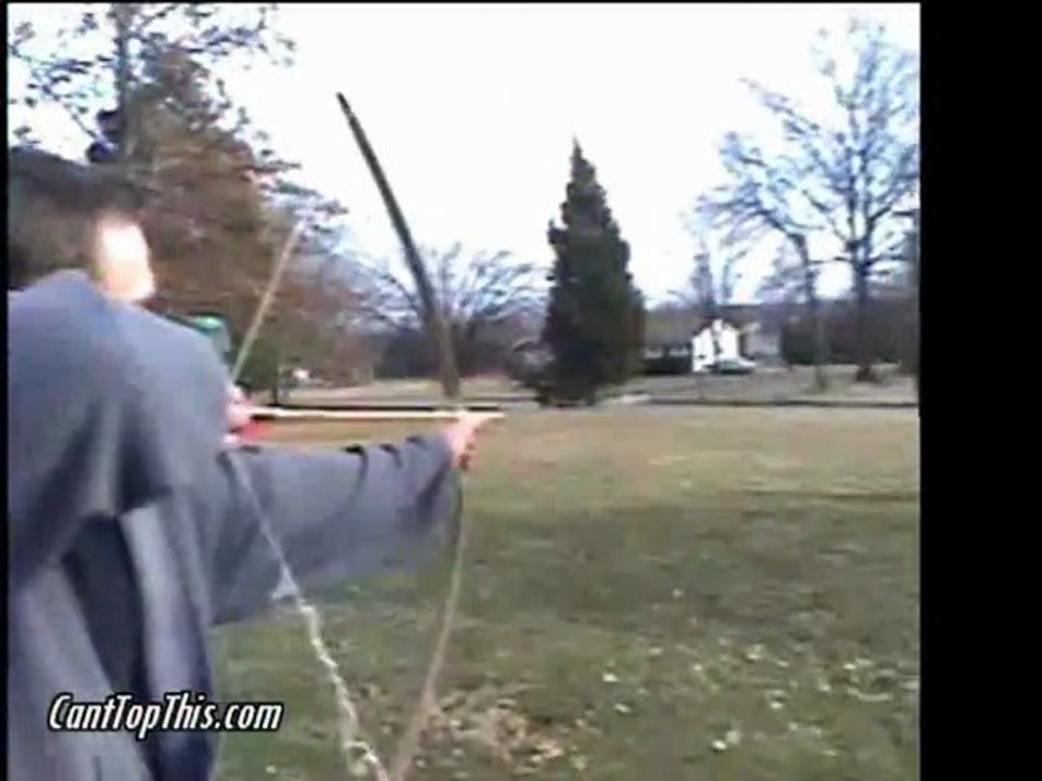 Guy gets shot with bow and arrow