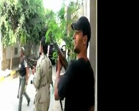 Libyan fighters capture senior Gaddafi figure.