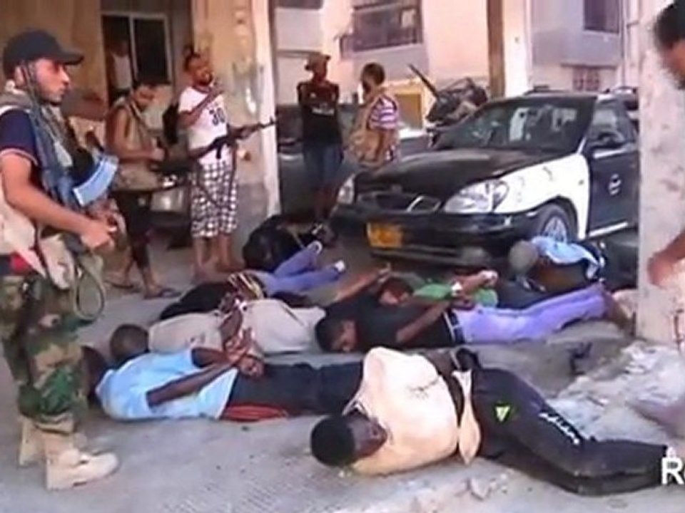 Amnesty: abuse by both sides in Libya