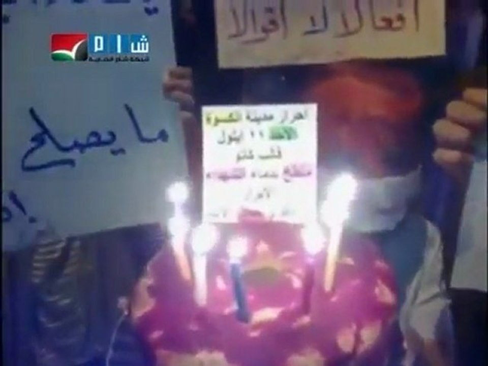 Protesters mark Assad birthday with cake