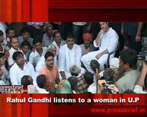 Rahul Gandhi listens to a woman in U.P