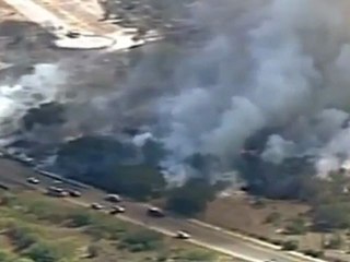 Battle to contain Texas wildfires