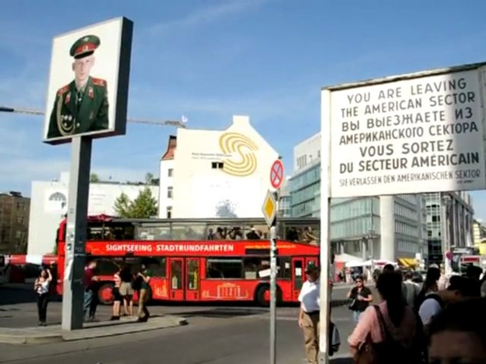 US flag at Berlin's Checkpoint Charlie at half-mast