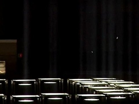 Twin towers of light shine in New York sky.