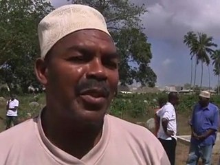 Relatives bury ferry victims, ask safety questions.