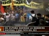 Encapuchados queman bandera española en Barcelona