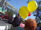 North Vancouver city mayor loves Vancouver block party rescuers balloon Elmo hat