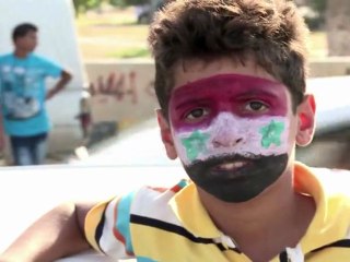 Libyans cheer visit by leaders of Britain and France