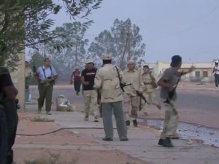 Firefight with pro-Kadhafi forces in Libya