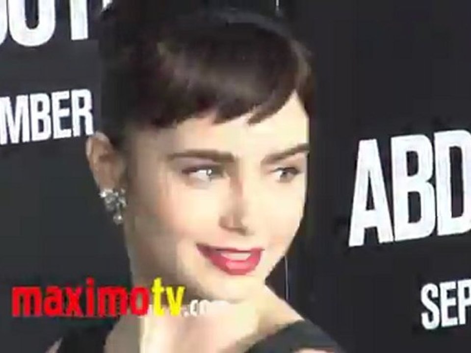 Lily Collins at ABDUCTION World Premiere Arrivals