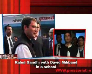 Rahul Gandhi with David Miliband in a school