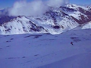 Abraham surfing down powder EXTREME POWDER SNOWBOARDING