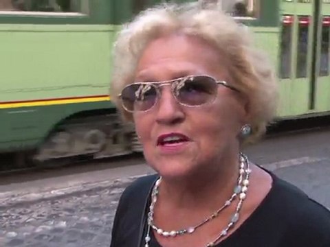 Italians react to debt rating downgrade