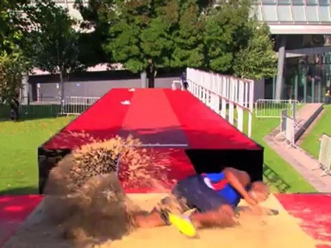 J.J. Jegede jumps over three MINI Coopers