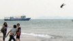 Man Throws Puppy into Ocean, Chinese Netizens Outraged