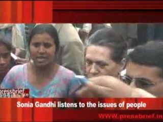 Sonia Gandhi listens to the issues of people