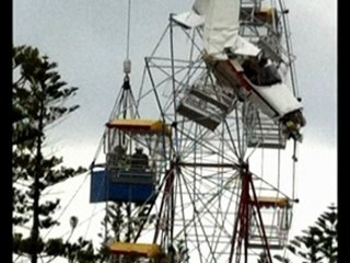 Plane crashes into ferris wheel