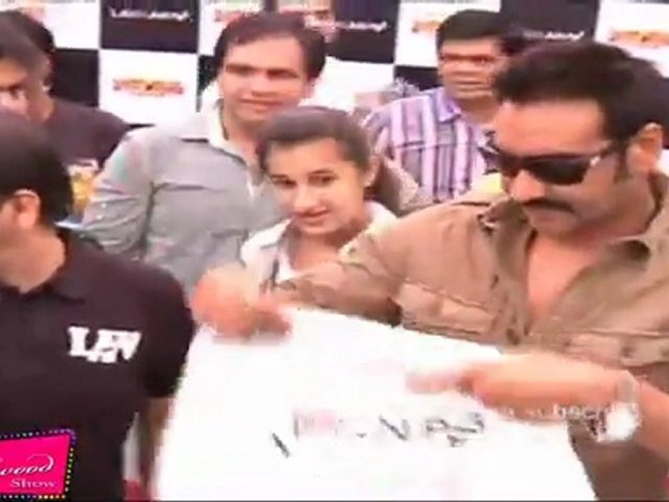 Ajay Devgan Gives  Autographs On T-Shirts Of lawman To Fans