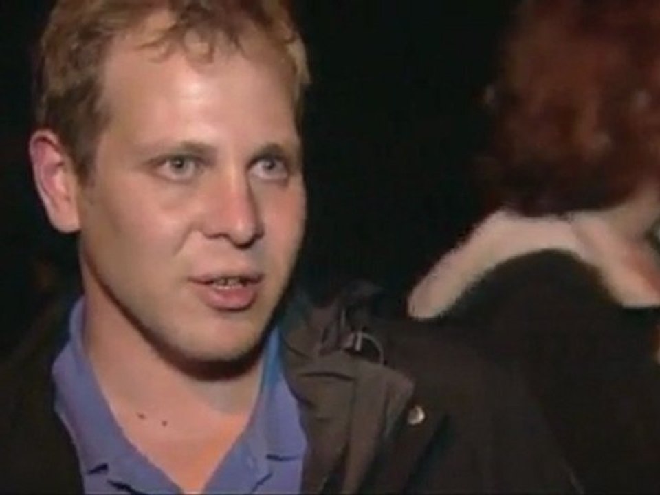 Flowers and candles at Apple HQ