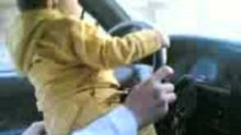 baby draiving a car