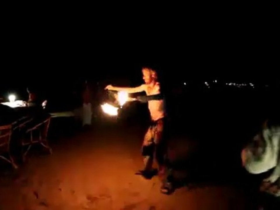 Fire dancing. Trance party. Anjuna beach. Goa