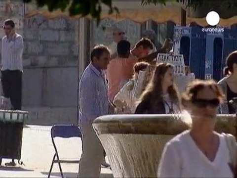 Trichet warns as lenders give lukewarm approval to Greek aid