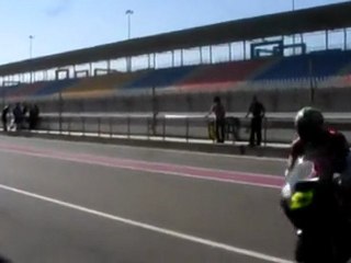 Troy Bayliss takes to the track on the 1098