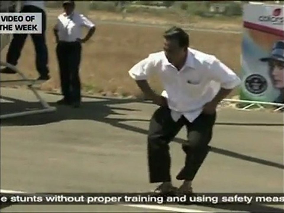 Farthest distance limbo skating under cars