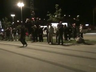 Crazy man jumps over Lamborghini