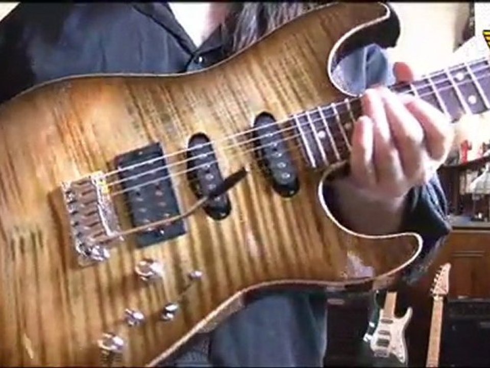 Tom Anderson Drop Top in light tiger eye burst at World Guitars