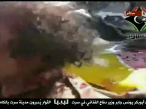 GADDAFI INJURED: Dramatic video shows badly injured Gaddafi