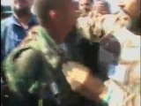 NTC fighters laud man they say killed Gaddafi