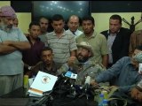 GADDAFI GUNS: Libyan commander shows off dictator's weapons