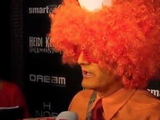 Heidi Klum monkeys around with Halloween.