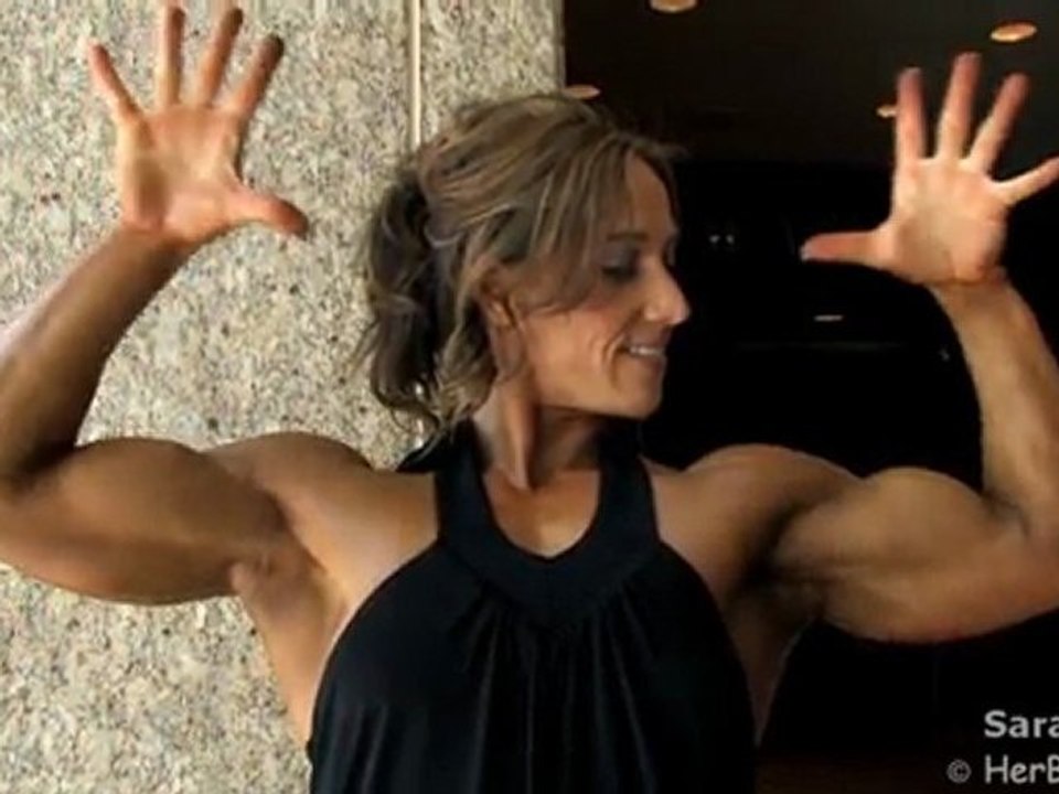 Sarah_Hayes_09Eur_BlackDress_Double_the_Biceps_HD