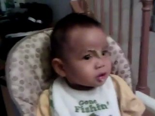 Baby laugh head bangs spoon.