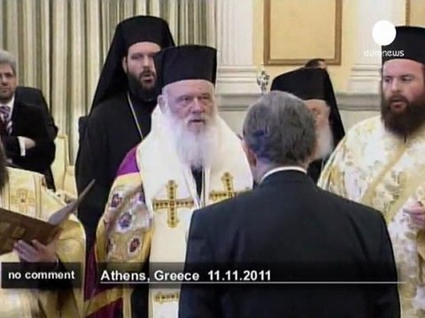 Lucas Papademos sworn in as Greece's prime... - no comment
