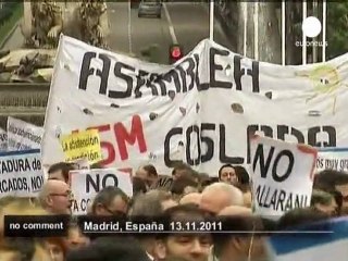 Скачать видео: Spain: Indignados march ahead of elections - no comment