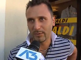 IL SALUTO DEI NEGOZIANTI