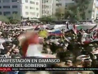 Miles salen a las calles para respaldar al gobierno sirio