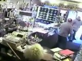 Jeweller fights off knifeman with broom