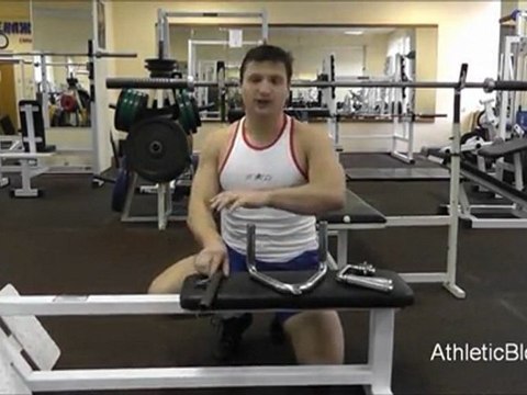 Тяга к животу сидя на тренажере. Техника выполнения упражнения.