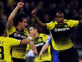 Dortmund 2-0 Schalke Lewandowski , Santana scored
