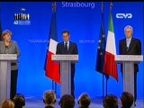 ساركوزي و ميركل يجسان نبض رئيس الوزراء الإيطالي